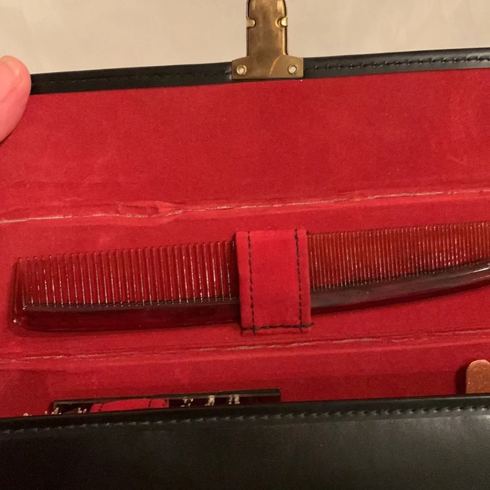 Vintage men’s grooming set in a black case and red interior